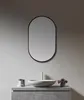 A modern bathroom vanity with a sink and mirror. Produktbild-Vorschau