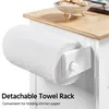 A close-up view of a white kitchen cart with a wooden countertop, featuring a roll of paper towels attached to the side. Produktbild-Vorschau