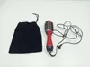 A red and black Revlon hair dryer brush and a black drawstring bag are laid out on a white surface. Voir les images du produit