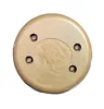 The underside of a gold-colored foot switch is shown against a white background. Produktbild-Vorschau