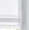 A close-up view of a white Roman blind with a thin gray decorative stitch along the edges, hanging in front of a window. Produktbild-Vorschau