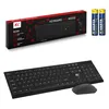 A black wireless keyboard and mouse set are displayed alongside two AAA batteries and the product's packaging. Produktbild-Vorschau