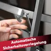 A close-up of a hand interacting with a metal latch mechanism on a folding step stool. Produktbild-Vorschau