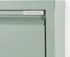 A close-up shot of a section of a light green metal cabinet. Produktbild-Vorschau
