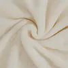 A close-up, swirled texture of a soft, plush fabric, likely a blanket or bedsheet. Produktbild-Vorschau