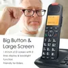 An elderly man is shown adjusting his glasses, with a cordless phone and its base in the foreground. Text highlights the phone's features. Náhled obrázku produktu