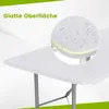 A close-up view of a white folding table with water droplets on its surface, highlighting its smooth and waterproof feature. Náhľad obrázku produktu