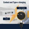 Close-up of a device's charging port and a USB cable, with text overlays highlighting features. Produktbild-Vorschau