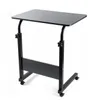 A black adjustable height laptop table with wheels is shown against a white background. Produktbild-Vorschau