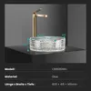 A gold faucet and a clear glass sink are displayed on a black surface against a gray background. Náhled obrázku produktu