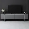 A modern TV stand with a television on top, set against a dark paneled wall. Voir les images du produit