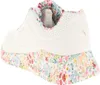 A side view of a white sneaker with a floral pattern on the sole and collar. Produktbild-Vorschau