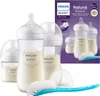 A set of Philips Avent baby bottles and a bottle brush, with packaging in the background. Anteprima dell’immagine prodotto