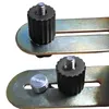 Close-up view of two adjustable knobs with threaded screws on metal brackets. Produktbild-Vorschau