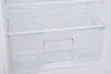 A clear plastic crisper drawer inside a white refrigerator. Produktbild-Vorschau