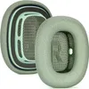 Two green ear pads for headphones are shown against a white background. Podgląd zdjęcia produktu