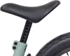 A close-up view of a bicycle seat and seat post. Produktbild-Vorschau