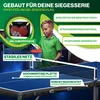 A young boy is playing table tennis with a KESSER® Mini Tischtennisplatte. The image highlights the product's features and benefits. Produktbild-Vorschau