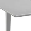 A close-up view of the corner of a gray table. Náhled obrázku produktu