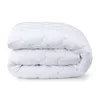A folded white mattress protector on a white background. Produktbild-Vorschau