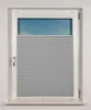 A close-up view of a window with a grey pleated blind partially covering it. Produktbild-Vorschau