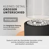 A close-up marketing image of a bioethanol table fireplace, highlighting its features and design. Produktbild-Vorschau