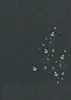 Close-up of a dark gray textured fabric with water droplets on it. Produktbild-Vorschau