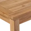 A close-up view of a wooden table surface and leg. Náhled obrázku produktu
