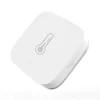 A white Aqara temperature and humidity sensor is shown against a white background. Voir les images du produit
