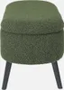 A green ottoman with storage and bouclé upholstery is shown from a front-facing angle, resting on dark legs against a white background. Produktbild-Vorschau