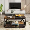 A living room scene featuring a coffee table with decorative items, a TV stand, and a television. Anteprima dell’immagine prodotto