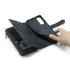 A hand is shown inserting a phone into a black wallet-style phone case. Produktbild-Vorschau