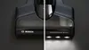 A close-up of a vacuum cleaner head, split down the middle to show two different views. Produktbild-Vorschau