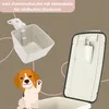 A product image featuring a dog food storage container and a scoop, with a cartoon dog illustration. Produktbild-Vorschau