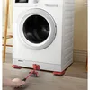 A person is using a red furniture mover tool to lift and move a white washing machine. Produktbild-Vorschau