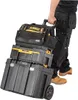 A person is pulling a stack of DeWalt toolboxes on wheels. Anteprima dell’immagine prodotto