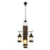 A vintage-style chandelier with four lantern-shaped lights hanging from a wooden beam. Produktbild-Vorschau