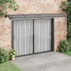 A door awning installed above sliding glass doors on a brick wall. Náhled obrázku produktu