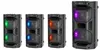 Four portable Bluetooth speakers of varying sizes are displayed side-by-side against a white background. The speakers have illuminated LED lights in different colors. Náhľad obrázku produktu