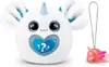 A white plush toy unicorn with large blue glitter eyes and a blue glitter heart with question marks on its chest. A small pink axolotl toy with wings hangs from a silver chain next to it. Produktbild-Vorschau