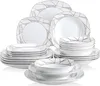 A collection of white dinnerware with a geometric gold and gray pattern, stacked and arranged. Produktbild-Vorschau