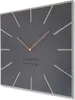 A square wall clock with a dark gray face and light gray hour markers. Rose gold hands point to the time. Anteprima dell’immagine prodotto