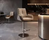 A modern kitchen or dining area with bar stools and a counter. Produktbild-Vorschau