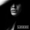 A close-up black and white image of a woman's face, partially obscured by her hand, with the word "LONDON" in a white box at the bottom right. Náhľad obrázku produktu
