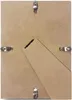 The back of a picture frame with a stand and clips. Produktbild-Vorschau