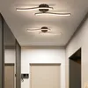 A hallway with modern ceiling lights. Voir les images du produit