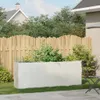 A white rectangular planter filled with plants sits on a lawn in front of a wooden fence. A chair and table are visible to the right. Anteprima dell’immagine prodotto