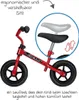 A red balance bike with a close-up view of its adjustable seat. Produktbild-Vorschau