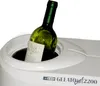 A bottle of white wine is placed in a white ice cream maker. Voir les images du produit