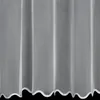 A close-up view of a white sheer curtain with a scalloped hem. Produktbild-Vorschau